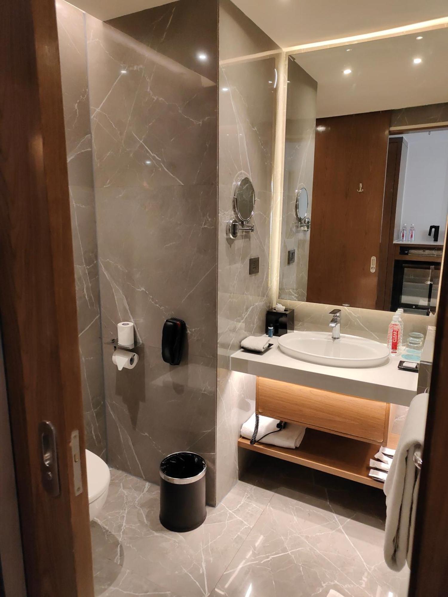 Le Meridien Hyderabad Exterior photo Bathroom of a room at the hotel