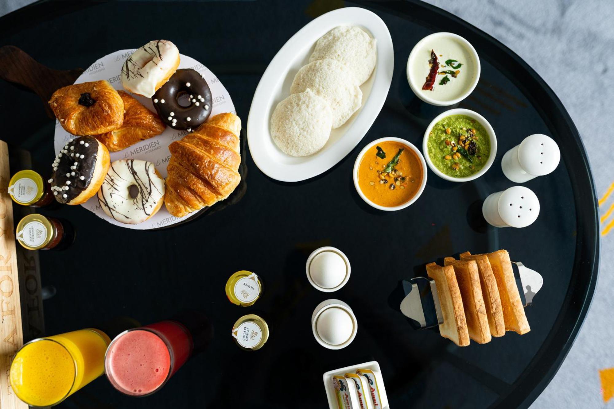 Le Meridien Hyderabad Exterior photo A breakfast buffet at a hotel